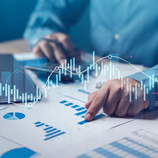Person reviewing business analytics and performance charts